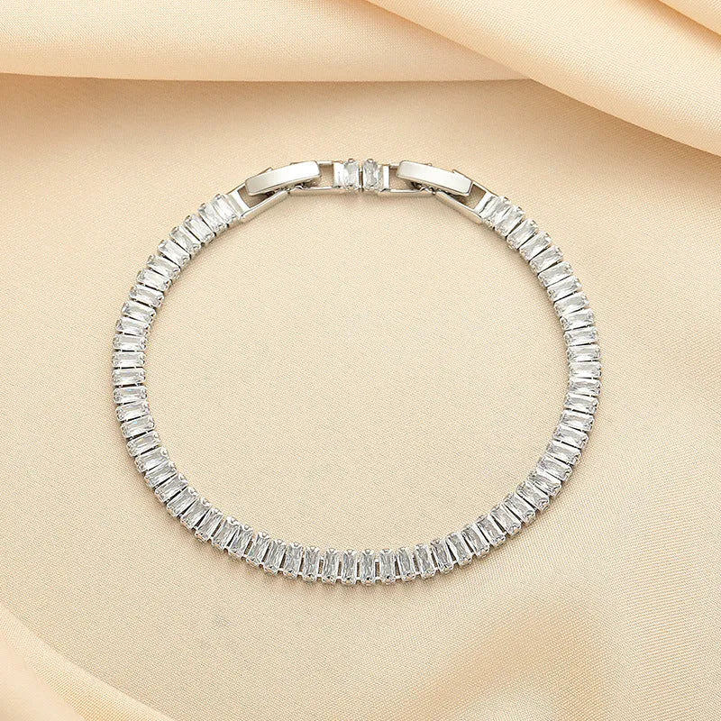Geometric rectangular brass bracelet with zircon inlays in champagne gold or silver colour