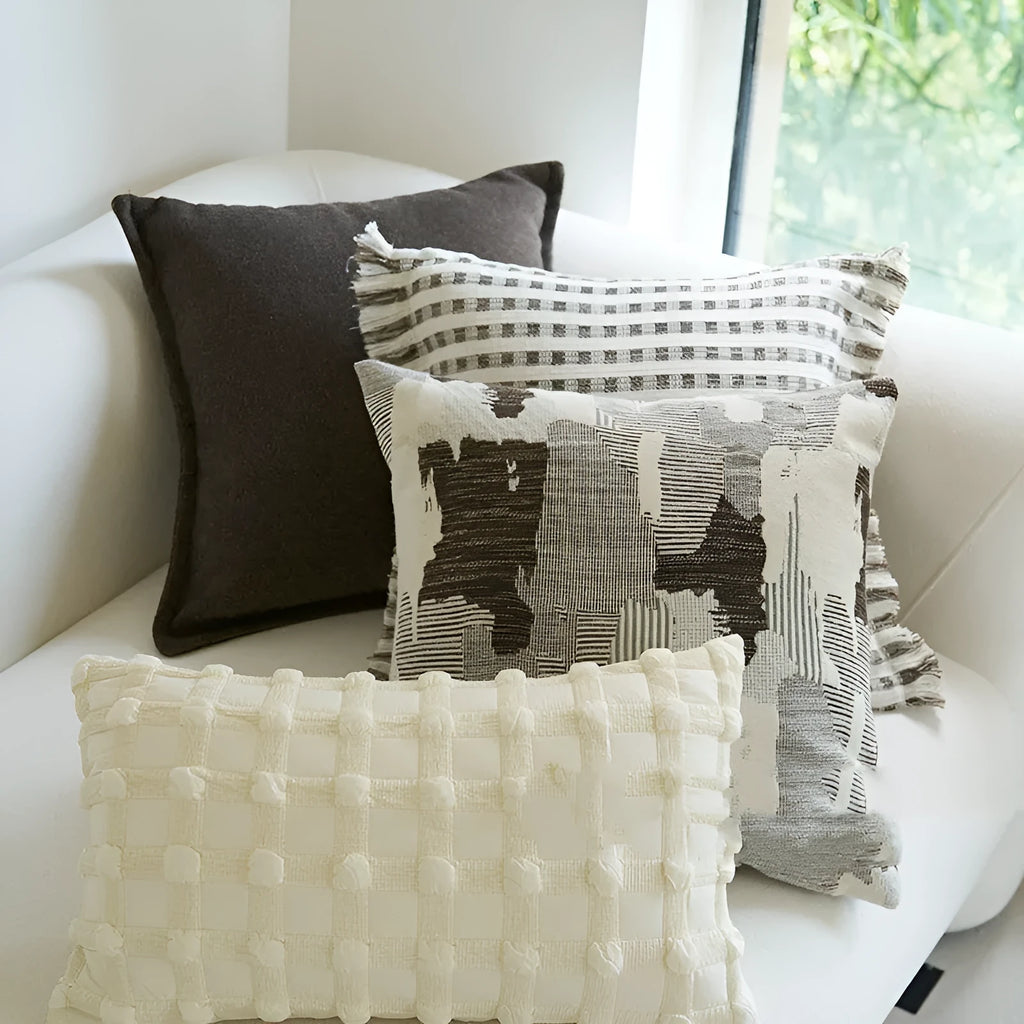 Coffee brown striped mid-ancient Chinese style decorative pillow cushion on a sofa.