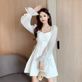 White chiffon patchwork waist-slimming dress with long sleeves and skirt on mannequin