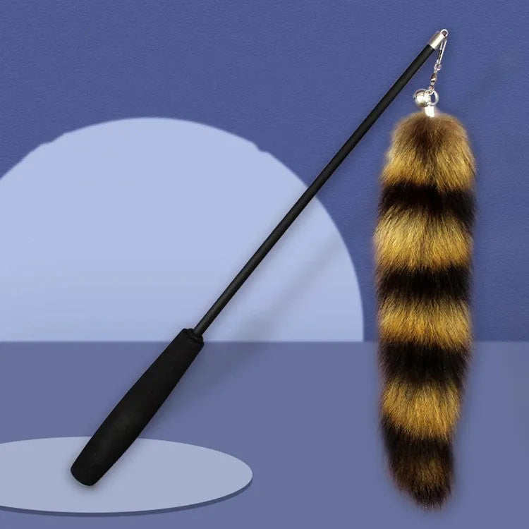 Black cat toy wand with feather teaser on elastic string, 42cm length