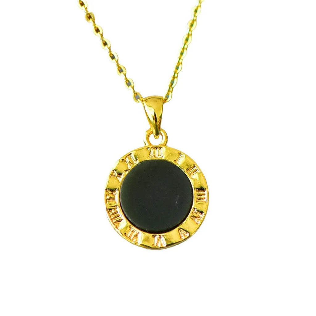 Flat ink blue Hetian Jade pendant with copper inlay design on a chain.
