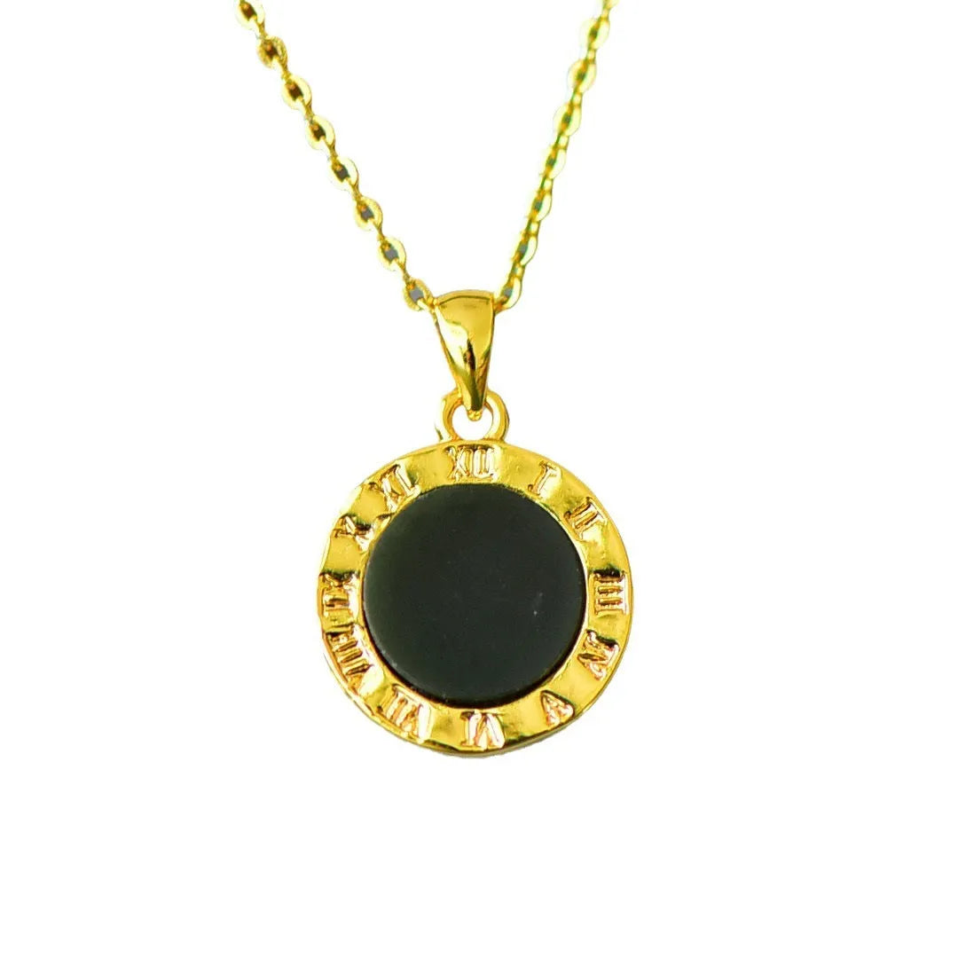 Flat ink blue Hetian Jade pendant with copper inlay design on a chain.