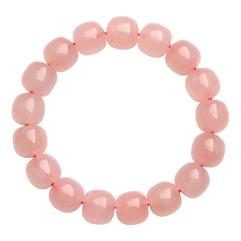 Natural pink crystal barrel bead bracelet with geometric design, 8-10mm beads