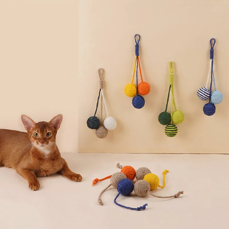 Bite-resistant cat teaser stick set with colourful catnip balls on blue background
