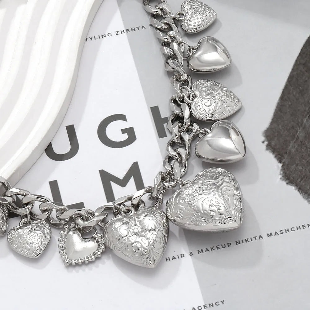 Exaggerated style carved heart pendant necklace for women in gold or white K on a regular chain.