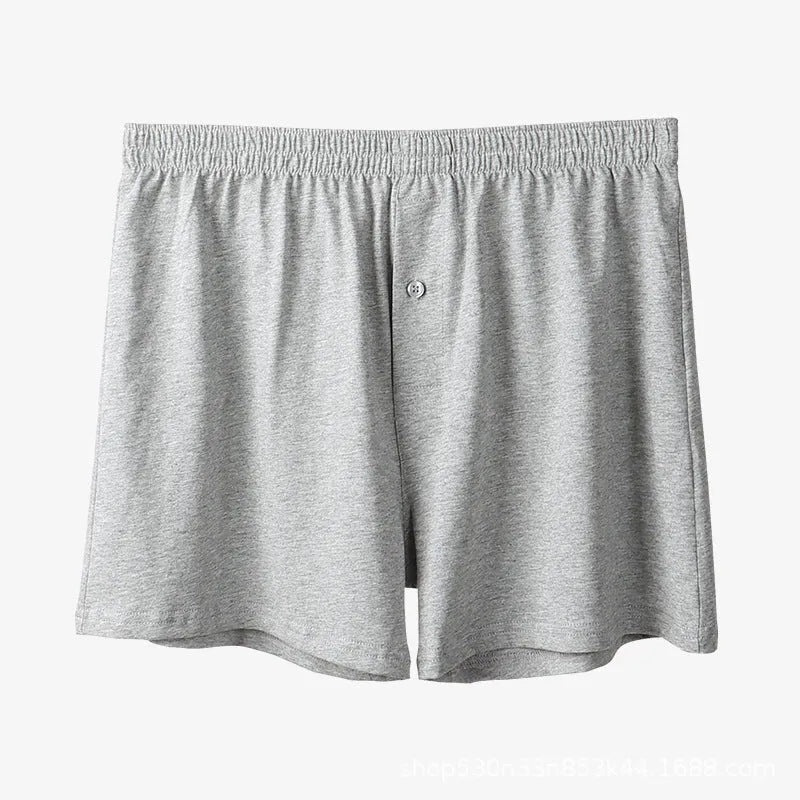 Men's loose fit pure cotton boxer shorts in black, light grey, and navy blue.