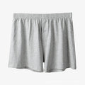 Men's loose fit pure cotton boxer shorts in black, light grey, and navy blue.
