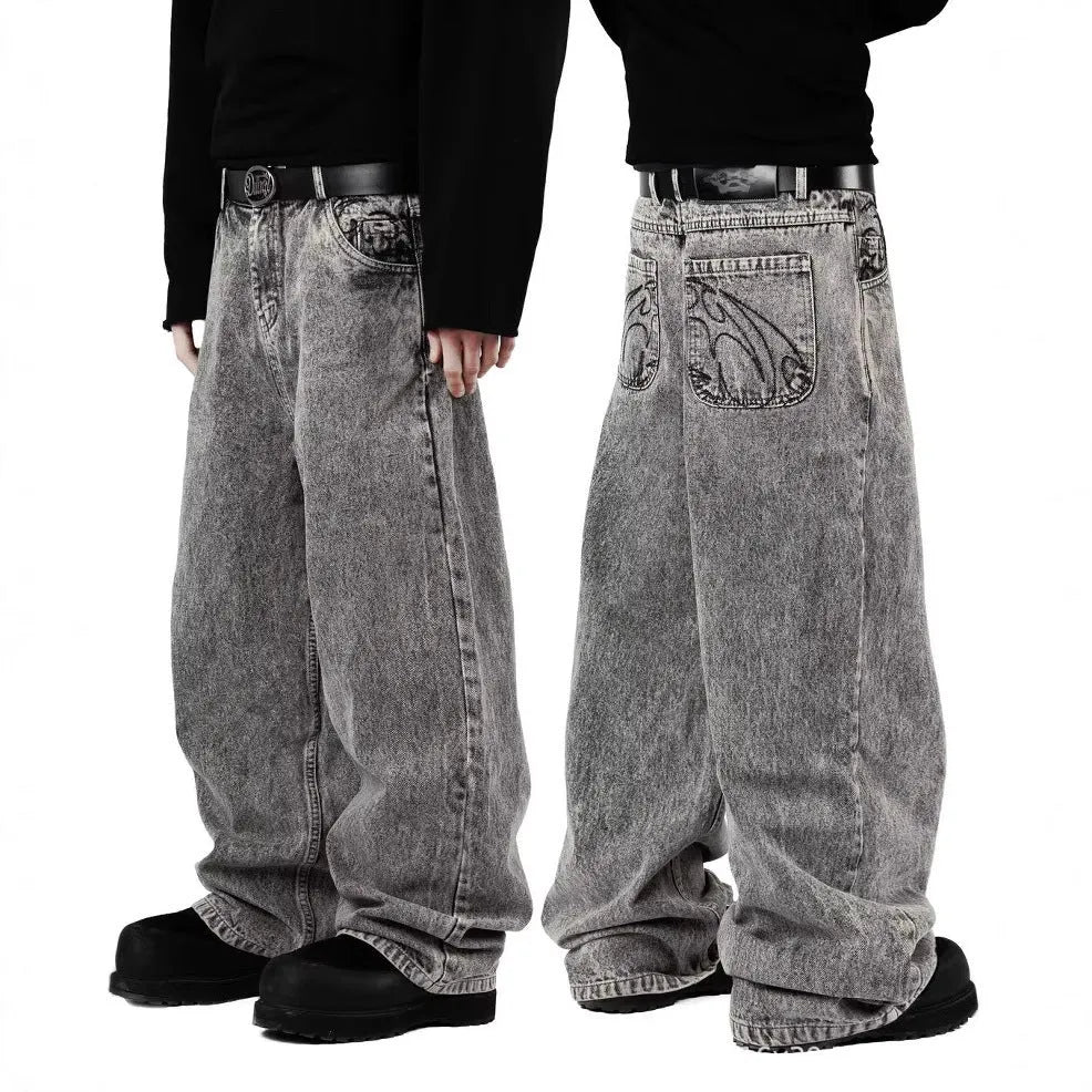 Grey loose-fit straight-leg cotton denim trousers on a mid-waist mannequin