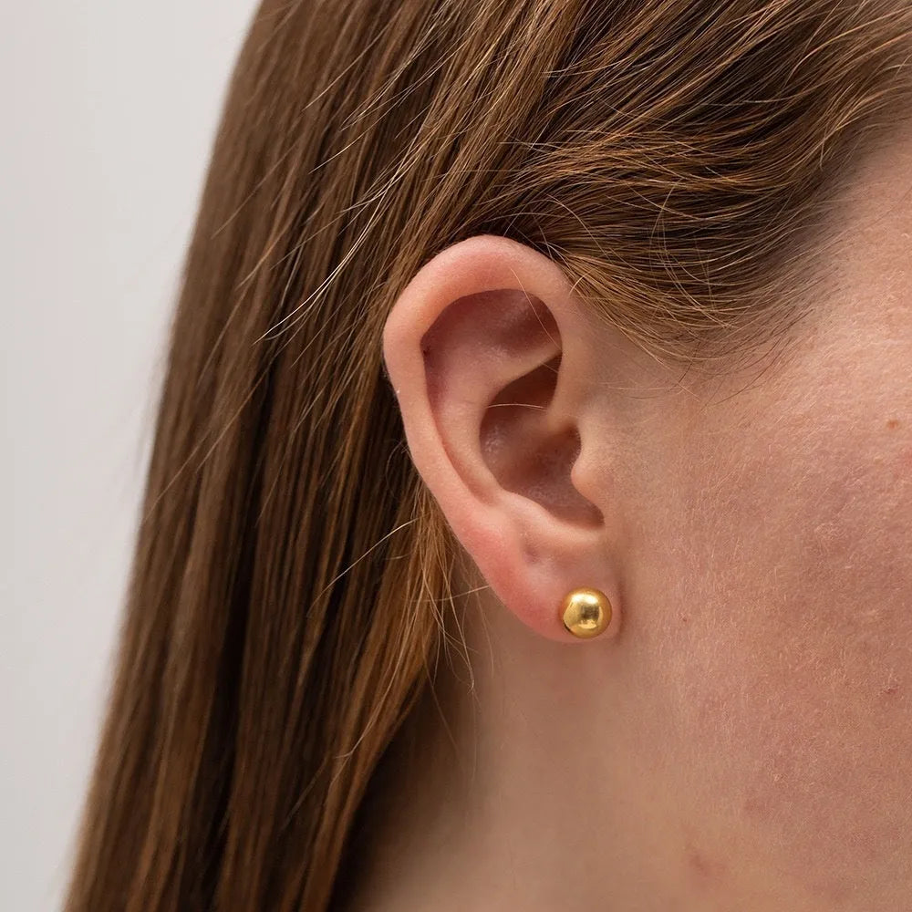 Stainless steel ball stud earrings with geometric round design and gold electroplated finish