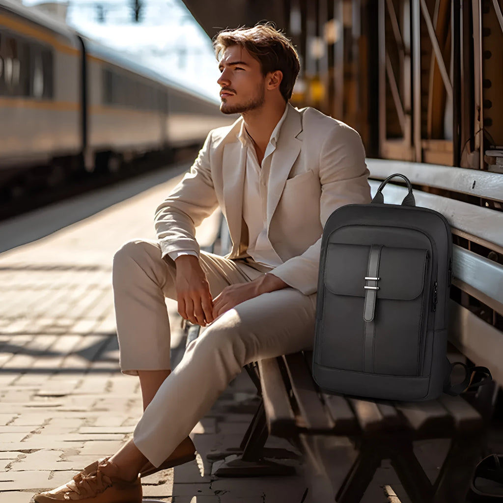 Black lightweight Oxford cloth backpack with sewing line detail for daily commute and urban use