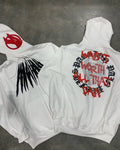 Black hooded sweatshirt with printed skull pattern and rhinestone detailing in loose cardigan style