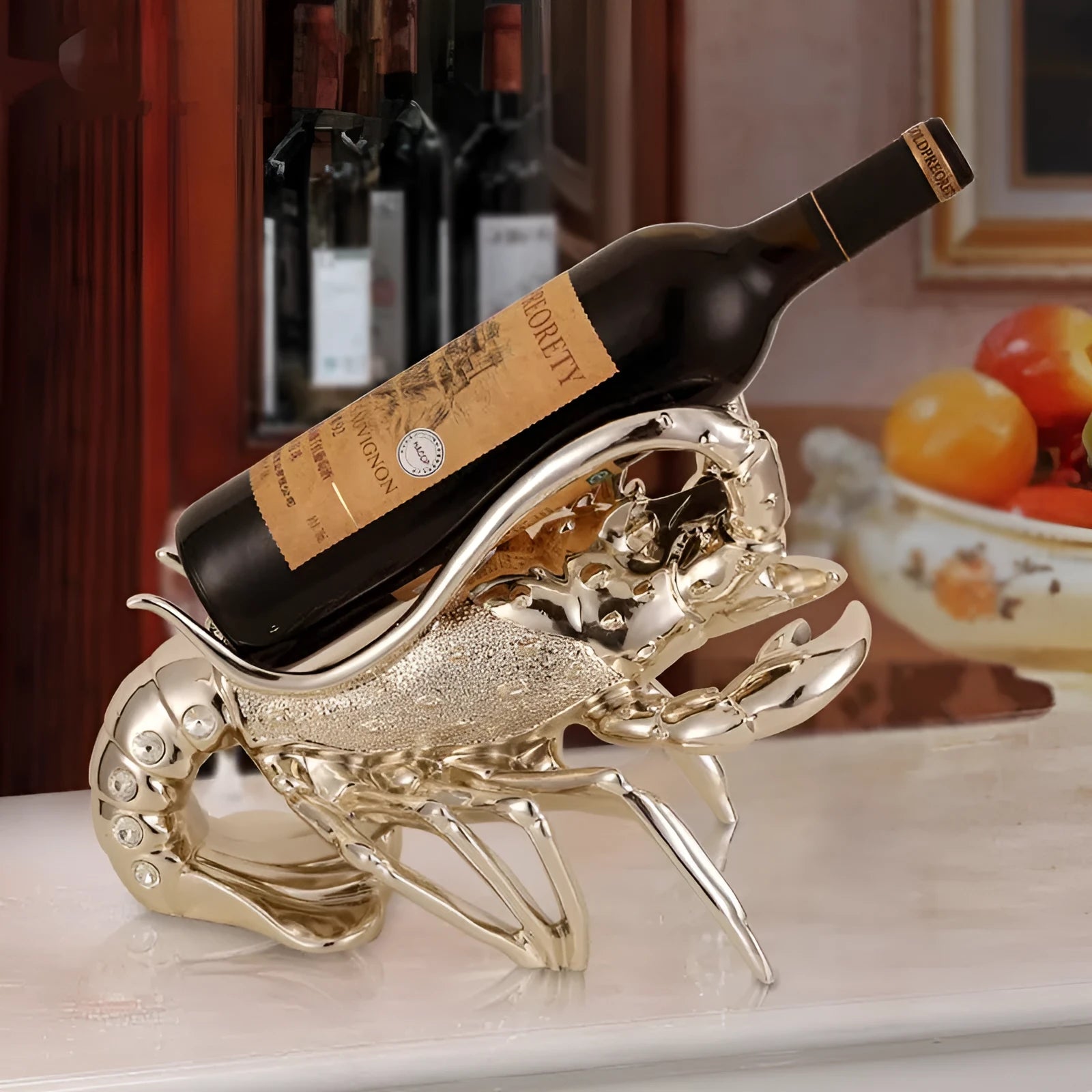 Lobster wine rack ornament in metallic finish displaying bottles