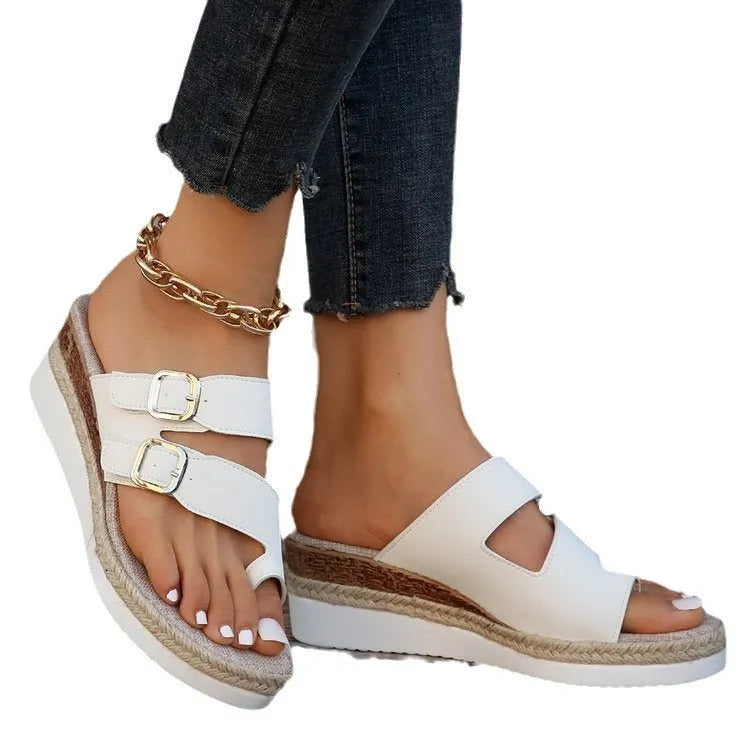 White patent leather wedge sandals with woven peep toe and finger fit design