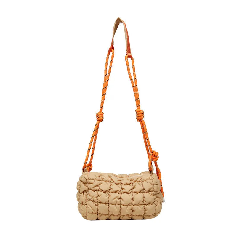 Women's lightweight nylon pillow-shaped messenger bag with rhombus pattern in chosen colour.