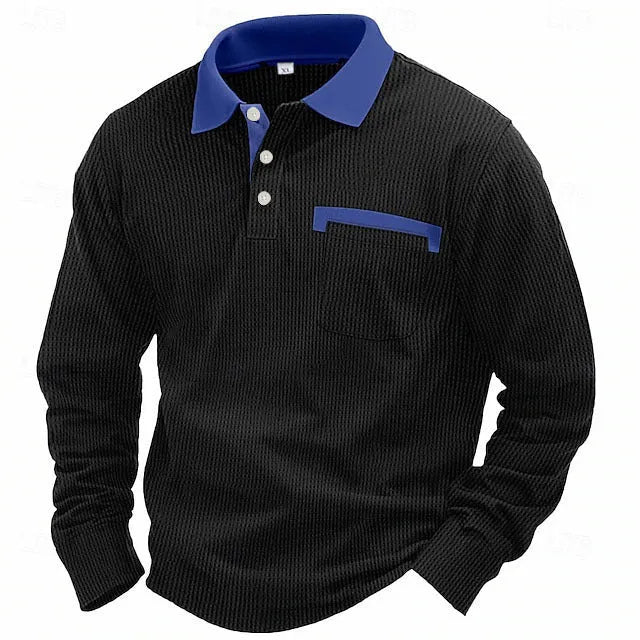 Man wearing a long-sleeved dark green waffle knit polo shirt with a loose fit and a collar.
