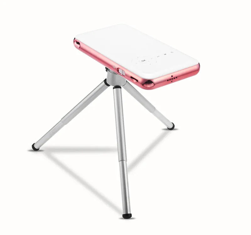 White rose gold miniature portable Android projector showing front view with lens and controls