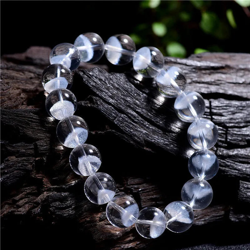 Women's white crystal ghost pyramid bracelet with Ruyi charm in graduated sizes