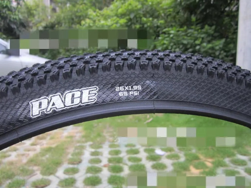 Ultralight puncture-proof mountain bike tyre showing tread pattern and available size options