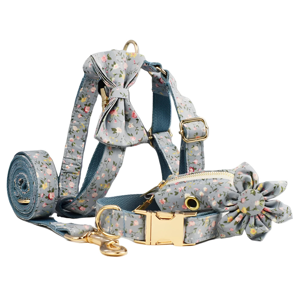 Blue floral pattern dog collar set with adjustable sizing and multiple accessory pieces