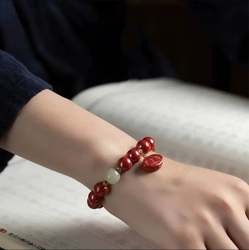 Natural cinnabar bracelet with Emperor Sandstone design in 8mm and 10mm sizes