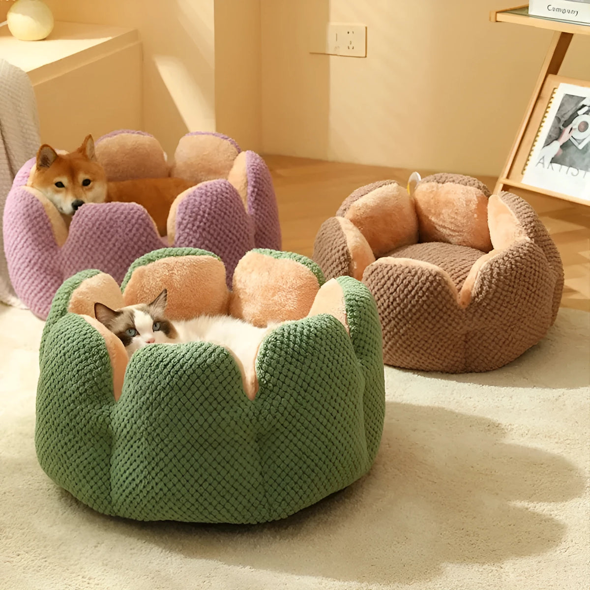 Green cactus petal shaped enclosed plush bed for a cat or small dog on a hardwood floor.