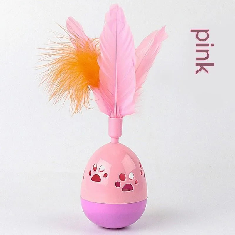 Tumbler bell cat toy in pink purple green, 15cm ABS plastic body with feathers and 6.5cm base