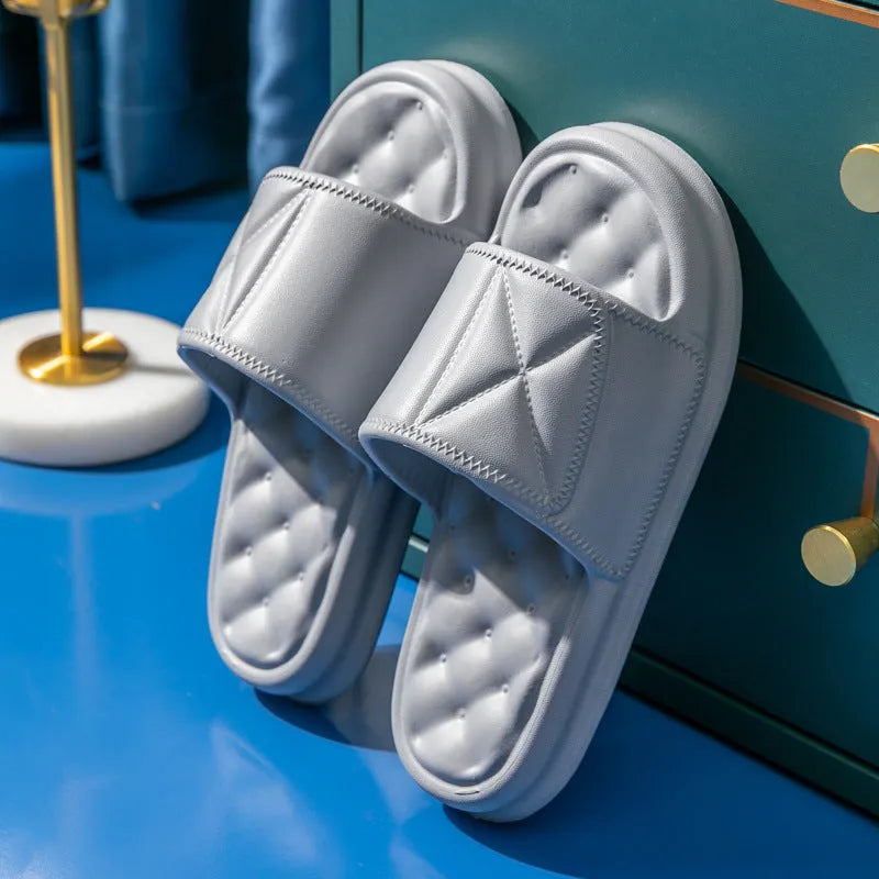 EVA bathroom slippers with 3.5cm sole in various colours on bathroom floor