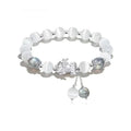 Natural black agate and gray opal couple bracelet with 10mm wave-shaped beads.
