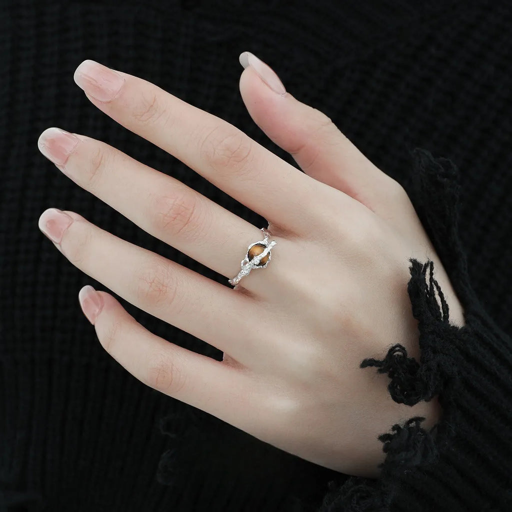Women's silver Saturn tigereye open ring with adjustable opening and white gold colour finish.
