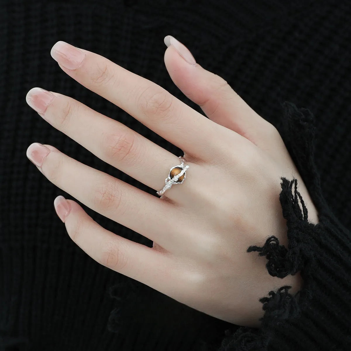 Women's silver Saturn tigereye open ring with adjustable opening and white gold colour finish.