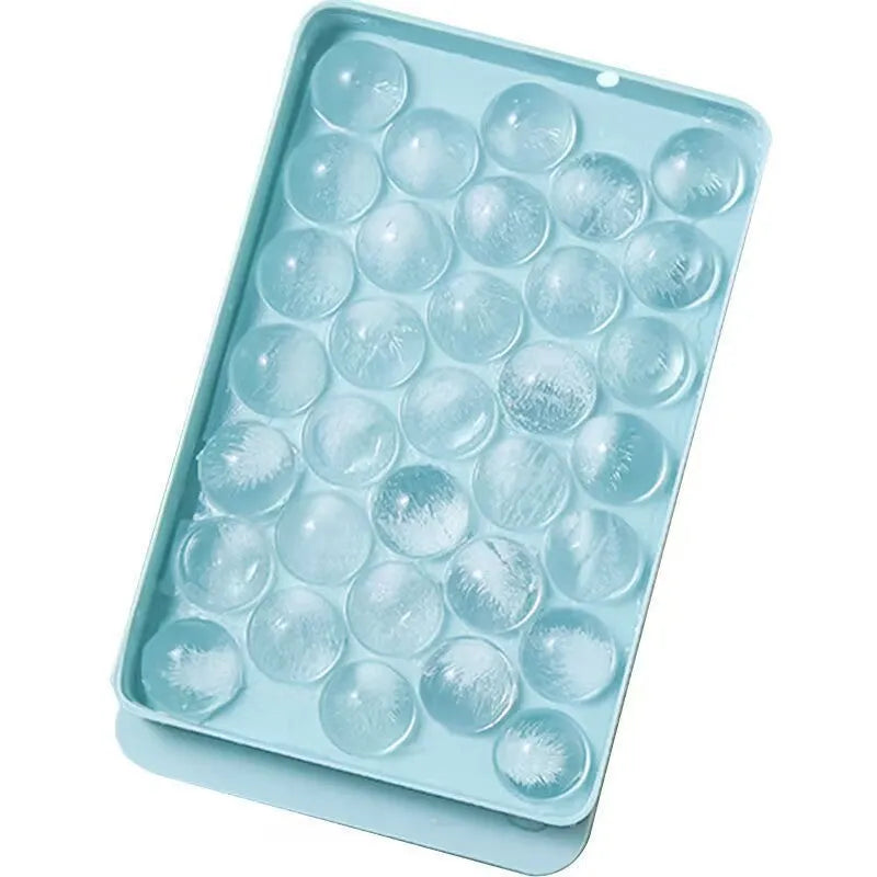 Blue silicone ice cube tray with lid showing 33 round grids, dimensions 24x14x3cm