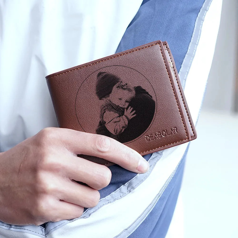 Men's leather wallet with a zip closure, presented as a gift.