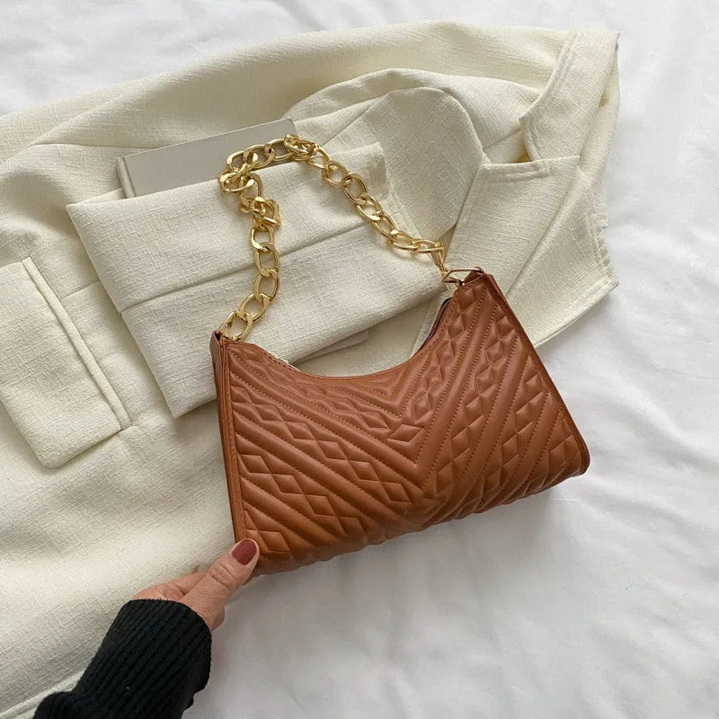 Brown PU pleated chain baguette shoulder bag showing vertical square shape with sewing line detailing