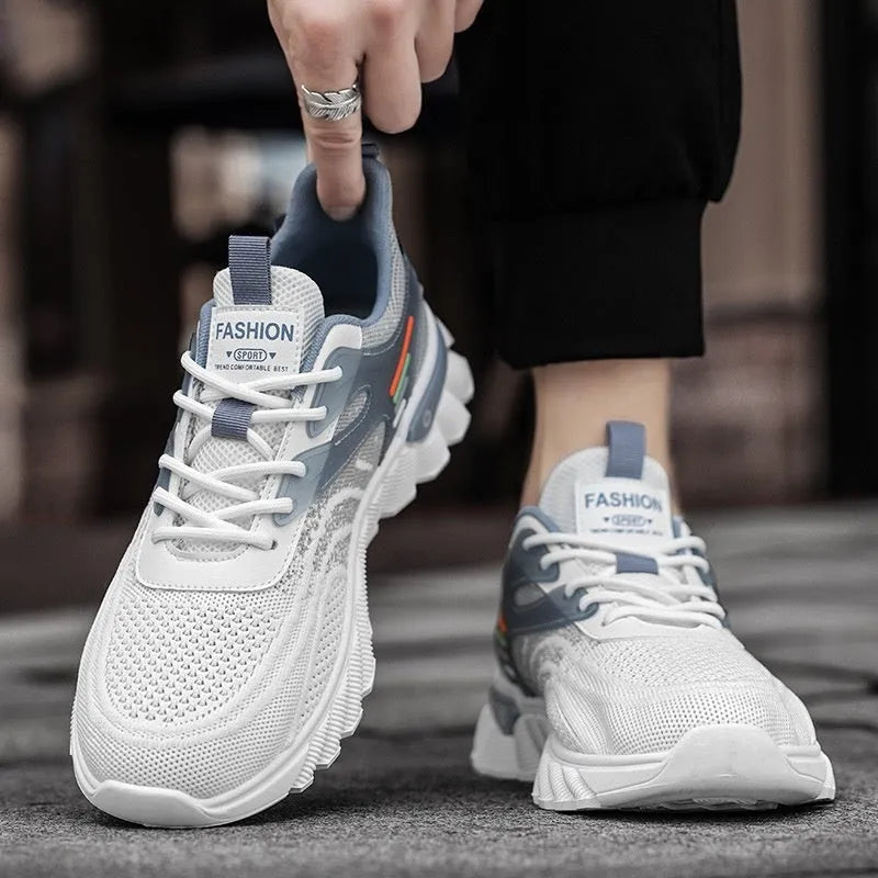 Men's white blue and black platform casual sports shoes with mesh upper and cross shoulder straps.