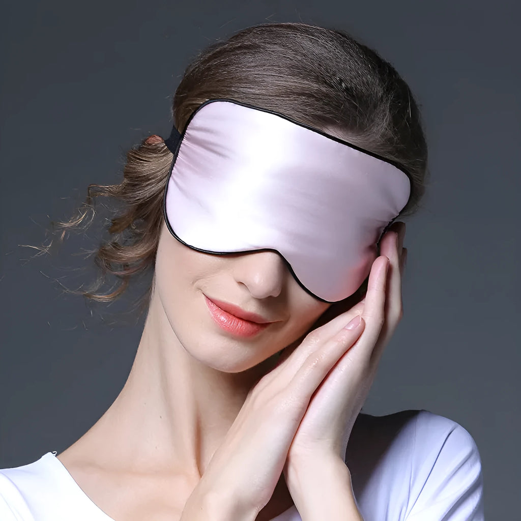 Double-sided mulberry silk eye mask in a selection of colours showing embroidered shading.