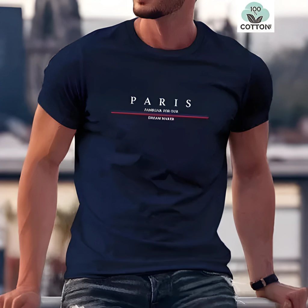 Man wearing a loose fit pure cotton t-shirt with a printed letter design on the front in apricot colour.