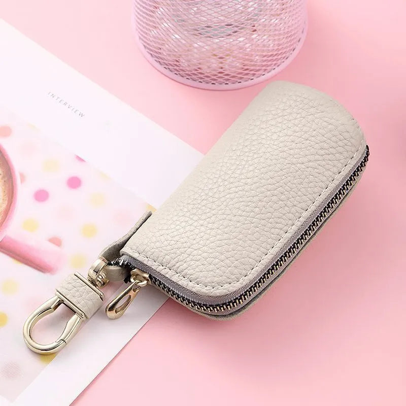Men's simple PU key case with zipper closure in black, grey, and pink colour options