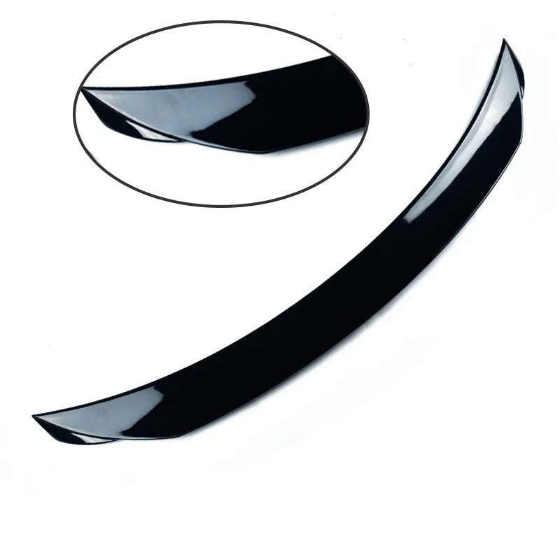 Bright black Mazda 3 tail trim accessory for 2014-2021 Axela Exela models with large fixed blade design