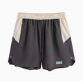 Man's loose grey workout shorts with elastic lace-up waistband, shown from side for gym use.