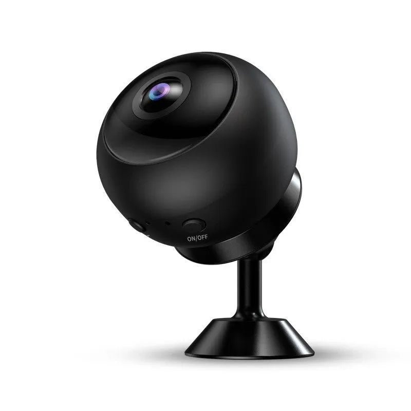 1080p wireless WiFi surveillance camera with ABS plastic housing on a flat surface.