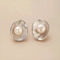 Sterling silver needle earrings with freshwater pearl geometric dangle design