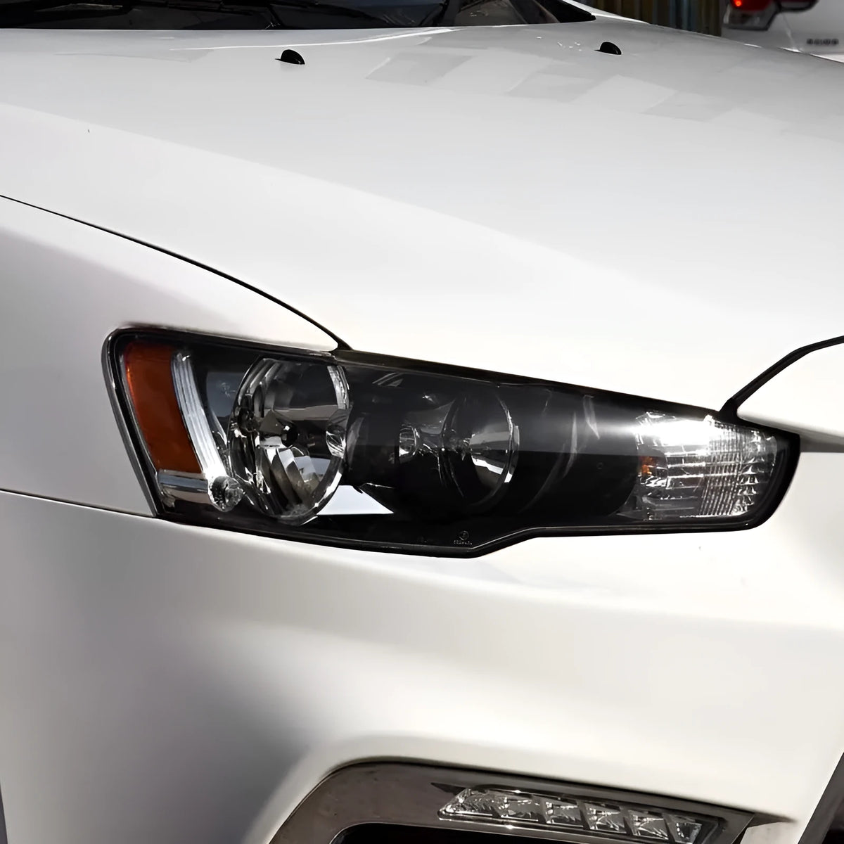 Transparent plastic headlight housing cover for vehicle lamp replacement measuring 50x30x20mm