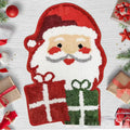 Square Christmas hallway mat with festive Santa Claus pattern on red background.
