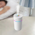 Compact car USB mini humidifier for vehicle aromatherapy and air humidification.