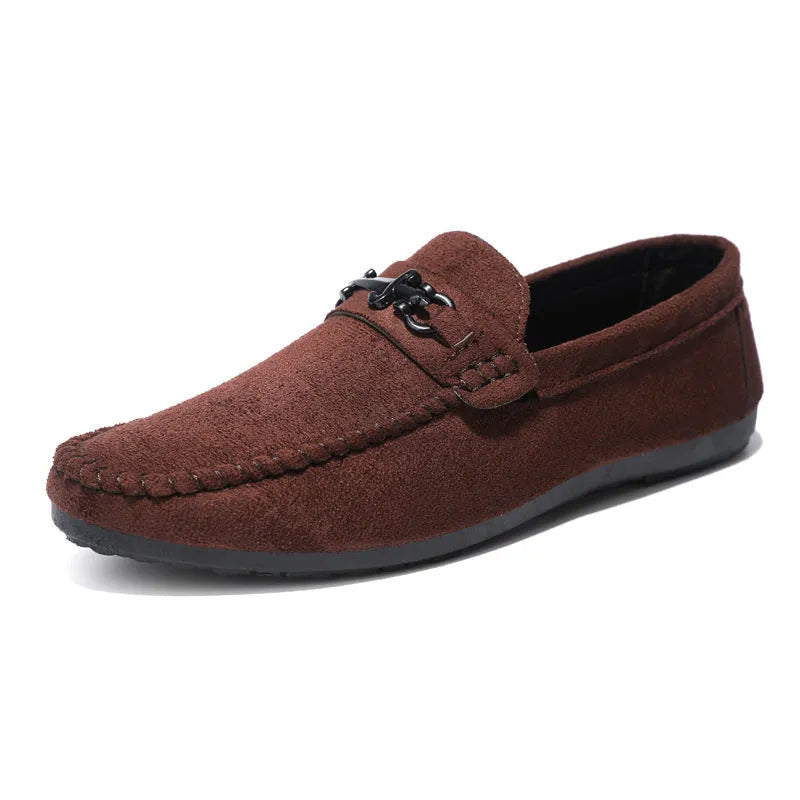 Men's black and brown waterproof slip-on loafers with round toe and low heel on a white background.