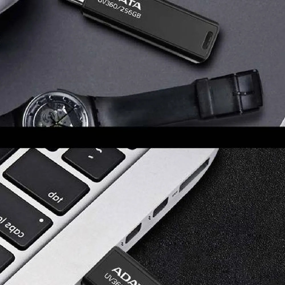 Black car-mounted USB flash drive with flexible plastic waterproof case showing size next to a ruler.