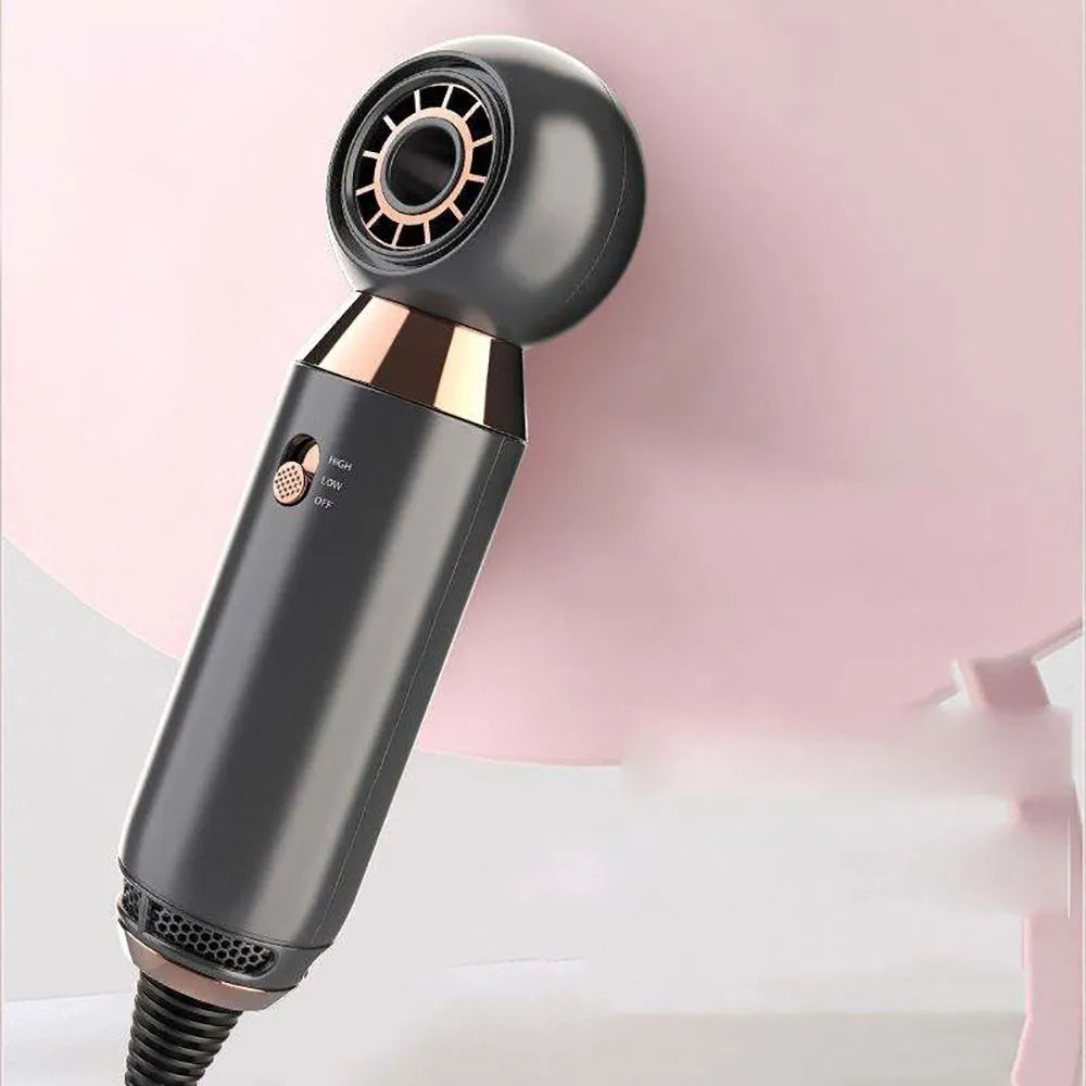 Compact white hair dryer with concentrator attachment on blue background